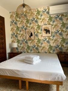 Postel nebo postele na pokoji v ubytování Casa dos Leones + 25 fotografií