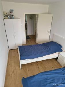 Postel nebo postele na pokoji v ubytování Schickes 3,5 Zimmer Apartment