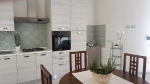 Kuchyň nebo kuchyňský kout v ubytování La Casa di Piera + 89 fotografií