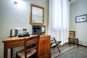 TV a/nebo společenská místnost v ubytování Bellevue House Affittacamere + 70 fotografií