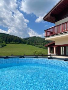 The swimming pool at or close to Hotel Studničky