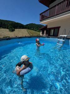 The swimming pool at or close to Hotel Studničky