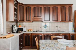Kuchyň nebo kuchyňský kout v ubytování Casa La Piazzetta