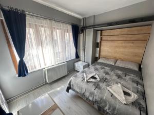 Postel nebo postele na pokoji v ubytování beydağı suit