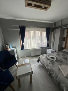 Postel nebo postele na pokoji v ubytování beydağı suit