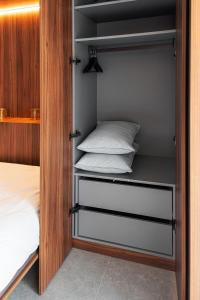 a bedroom with a bunk bed and a closet at Core Luxembourg -Studio Parking -50 Cents in Luxembourg +25 photos
