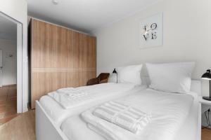 Postel nebo postele na pokoji v ubytování Haus Klaus Joy