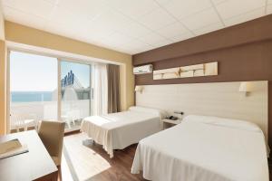 Posteľ alebo postele v izbe v ubytovaní Hotel Best Indalo