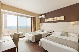 Posteľ alebo postele v izbe v ubytovaní Hotel Best Indalo