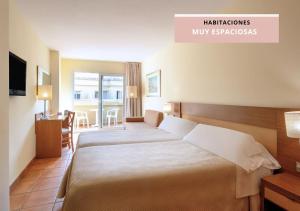 Postel nebo postele na pokoji v ubytování Hotel RH Casablanca Suites
