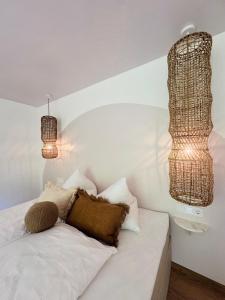 A bed or beds in a room at KWT Lodge
