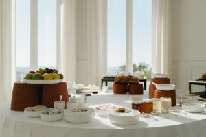 a white table with food on top of it at Les Hauts de Sancerre in Sancerre