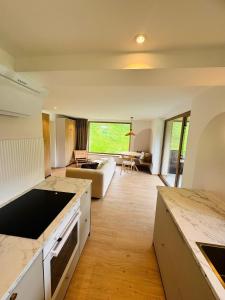 A kitchen or kitchenette at KWT Lodge