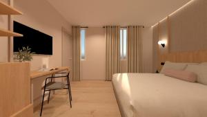 Postel nebo postele na pokoji v ubytování Hotel Las Rocas de Isla