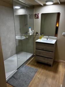a bathroom with a shower and a sink at Casa Gracia in Granda