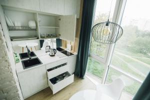 Η κουζίνα ή μικρή κουζίνα στο ATLANT luxury Apart Studio навпроти ТЦ ДЕПОТ