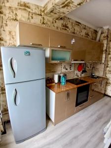 Η κουζίνα ή μικρή κουζίνα στο Marwa Guest House Modern 2-Room Apartment 78 m2