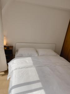 东京塔附近3床公寓にあるベッド
