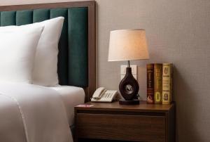 Voodi või voodid majutusasutuse Hanoi Vista Hotel toas