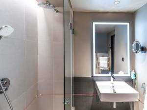 Ванная комната в Novotel Setubal