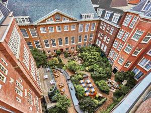 an overhead view of a building with a train in a courtyard at Sofitel Legend The Grand Amsterdam in Amsterdam