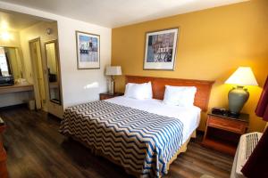 Postel nebo postele na pokoji v ubytování Capital O Hotel Inn Pendleton I-84