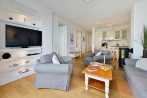 Ein Sitzbereich in der Unterkunft Ferienwohnung Silbermöwe