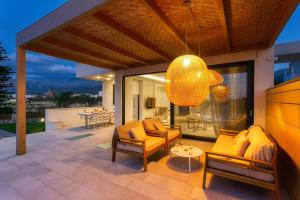 A seating area at Villa Mariba Blue by Villa Plus