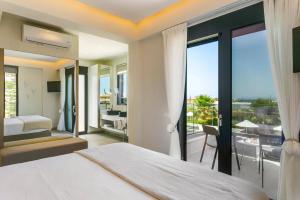 A bed or beds in a room at Villa Mariba Blue by Villa Plus Még 28 kép