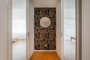 Ένα ή περισσότερα κρεβάτια σε δωμάτιο στο GuestReady - Urban luxury with Douro view +59 φωτογραφίες