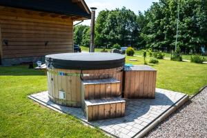 Vonkajšia záhrada v ubytovaní DOMEK POD LIMBAMI III