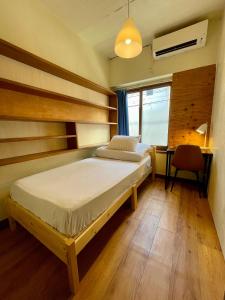 Voodi või voodid majutusasutuse Nomad Hostel Classic toas