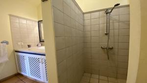 a bathroom with a shower and a sink at La Molina Casa in Calera +56 photos