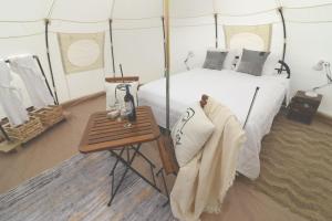 Postel nebo postele na pokoji v ubytování River Glampstay