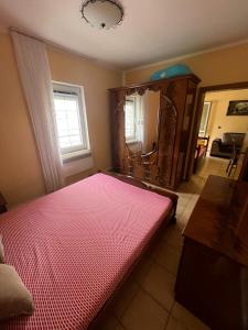Postel nebo postele na pokoji v ubytování Apartman Sutomore