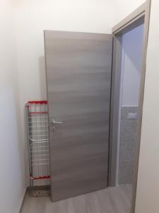 a metal door in a room with a radiator at Casa di SaleRosa in Rilievo +87 photos