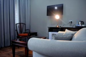 TV a/nebo společenská místnost v ubytování Chrismar Hotel Lusaka