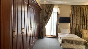 Postel nebo postele na pokoji v ubytování Lake view Palace Hotel