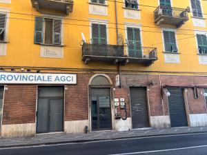 a building on a city street with a building at Le tre Vele in La Spezia