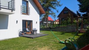 Zahrada ubytování APARTAMENTY UL.SARNIA