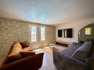 Posezení v ubytování Les Hauts de Bezouce, Vue, Piscine & Calme