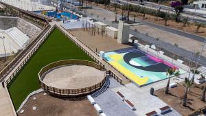 an overhead view of a swimming pool in a park at Hostal Casa Miguel Marbella in Marbella