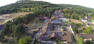 an aerial view of a large house on a hill at RANCHO-JURA in Podlesice