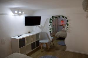 TV a/nebo společenská místnost v ubytování Casa Leolisa