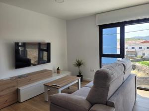 Χώρος καθιστικού στο Apartamentos AbAc