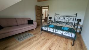 Postel nebo postele na pokoji v ubytování APARTAMENTY UL.SARNIA
