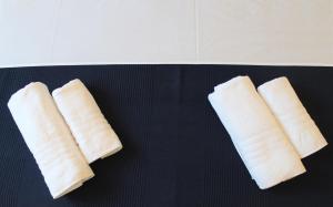 two pieces of breadsticks sitting on top of a table at Apartmani Marin in Vrbnik