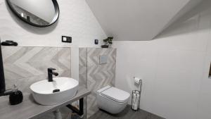 Koupelna v ubytování APARTAMENTY UL.SARNIA