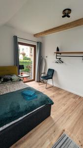 Postel nebo postele na pokoji v ubytování APARTAMENTY UL.SARNIA