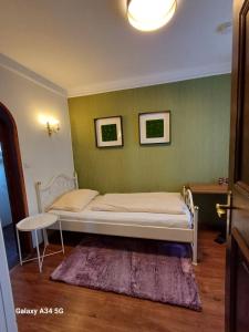 Posteľ alebo postele v izbe v ubytovaní Haus am Moos